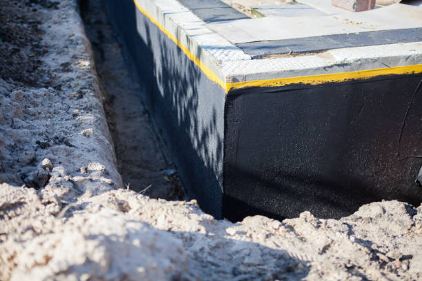 Professional Exterior Waterproofing technician working in Jordan, MN